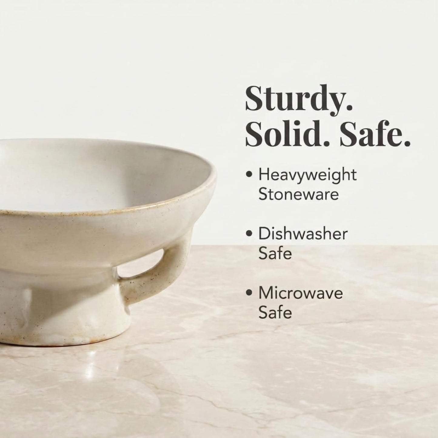 Creative Co-Op Stoneware Bowl with Handle and Base, Black Reactive Glaze