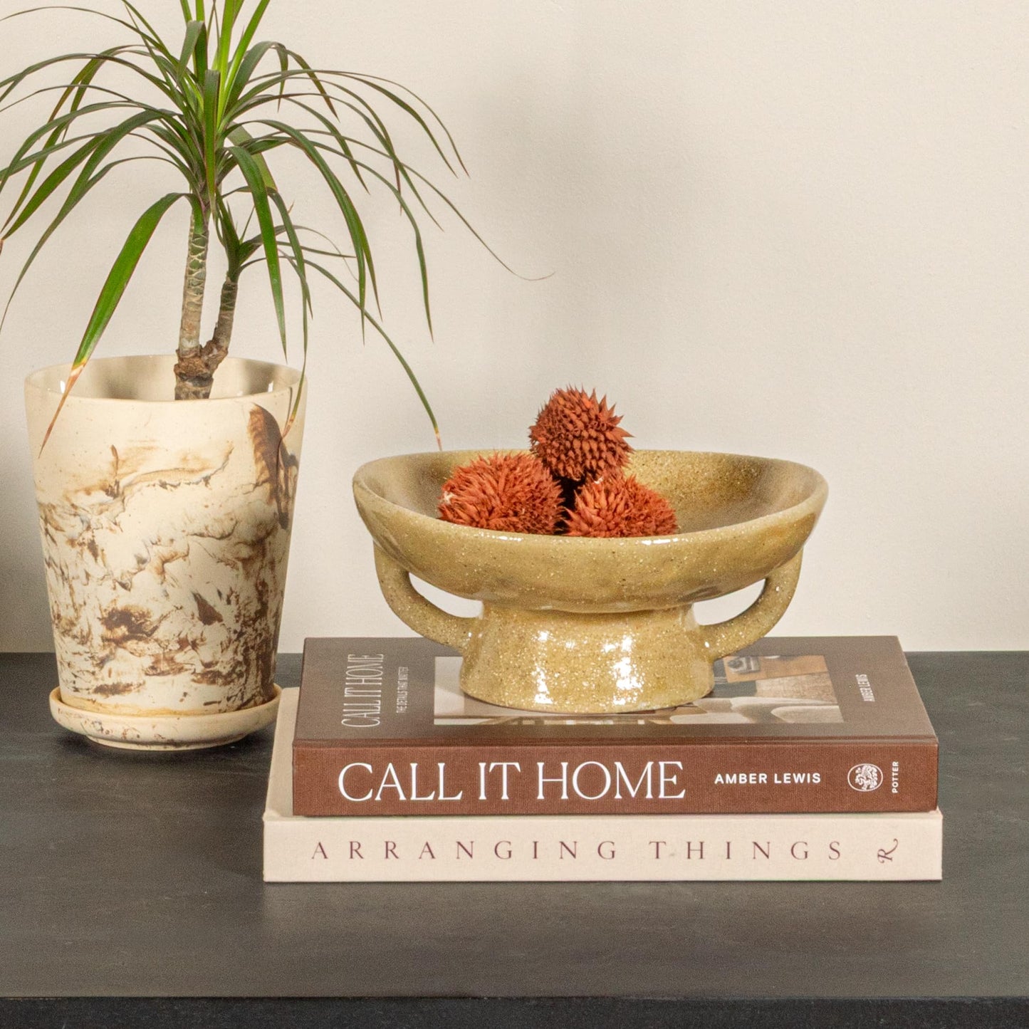 Creative Co-Op Stoneware Bowl with Handle and Base, Black Reactive Glaze